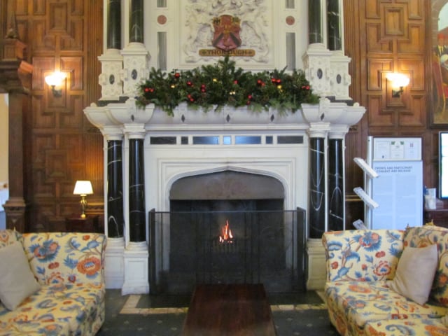 wedding flower disply over grand fireplace
